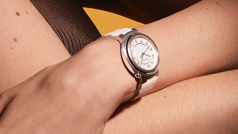 A woman models a watch