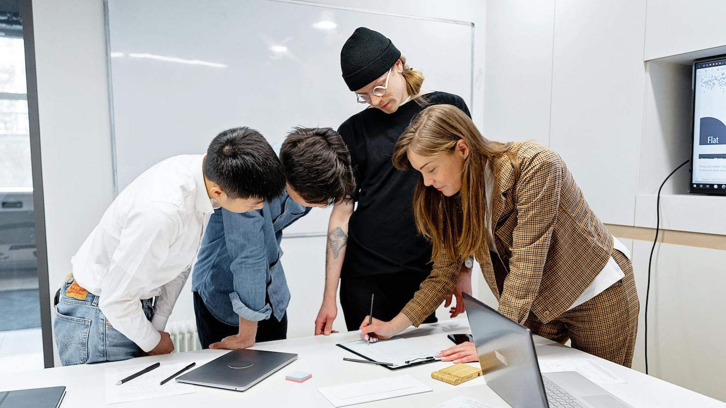 A group of workers in an office.